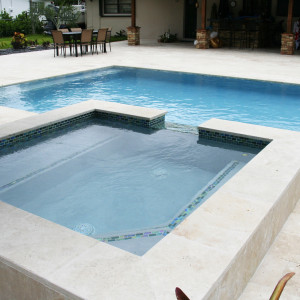 Palmetto Bay, FL New Pool Construction 7'x7' Raised Spa with tile spilway Palmetto Bay, FL New Pool Construction