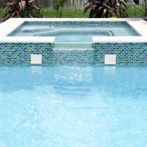 Palmetto Bay, FL New Pool Construction 7'x7' Raised Spa with glass 1'x2" tile Palmetto Bay, FL New Pool Construction