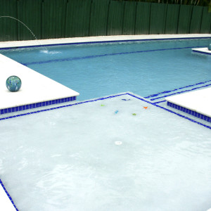 Cutler Bay, FL New Pool Construction 9'x9' Tanning Ledge with sky blue finish Cutler Bay, FL New Pool Construction